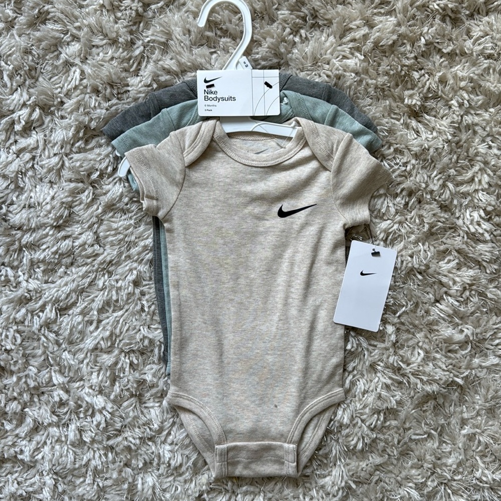 Brand new Nike onesies
